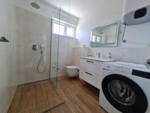 Kúpeľňa v ubytovaní Apartmani Adria