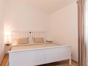 Posteľ alebo postele v izbe v ubytovaní Holiday Home Tomazin by Interhome