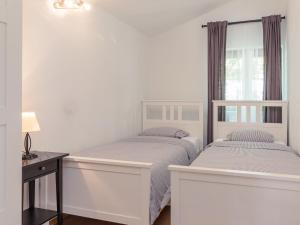 Posteľ alebo postele v izbe v ubytovaní Holiday Home Tomazin by Interhome