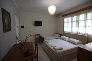 Postel nebo postele na pokoji v ubytování Vila Asidanu + 37 fotografií