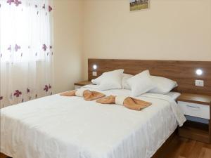 Postel nebo postele na pokoji v ubytování Apartment Baba Nevenka by Interhome