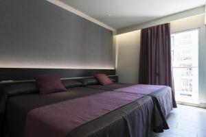 Cama o camas de una habitación en Hotel Papi Blau 30 fotos más