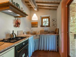 A kitchen or kitchenette at Holiday Home Ginestra by Interhome