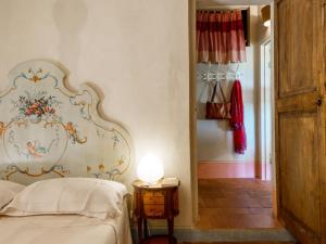 A bed or beds in a room at Holiday Home Ginestra by Interhome