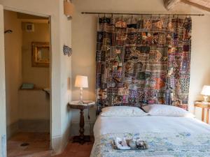 A bed or beds in a room at Holiday Home Ginestra by Interhome