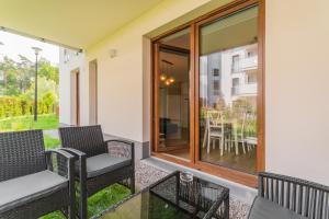 Posedenie v ubytovaní APARTAMENTY MIERZEJA - STEGNA PARK STUDIO, 500 m od plaży
