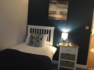 A bed or beds in a room at The Welford 