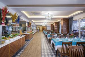 En restaurang eller annat matställe på Ramira Beach Hotel - All Inclusive
