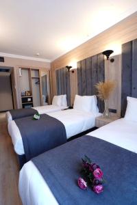 Postel nebo postele na pokoji v ubytování Mineo Hotel Taksim