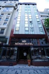 a man standing outside of a minnesota hotel at Mineo Hotel Taksim in Istanbul