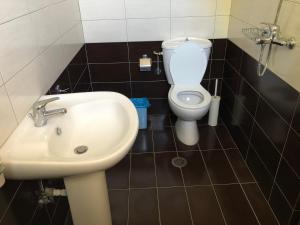 Et badeværelse på Alex Apartment