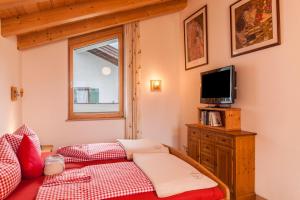 Säng eller sängar i ett rum på Das Bergzeit