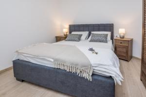 Łóżko lub łóżka w pokoju w obiekcie Apartments Maella