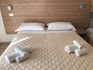 Postel nebo postele na pokoji v ubytování Hotel Costazzurra by Interlux