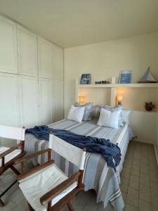 A bed or beds in a room at Villa Marisa - La Guarida