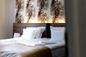 Postel nebo postele na pokoji v ubytování Be my apartman