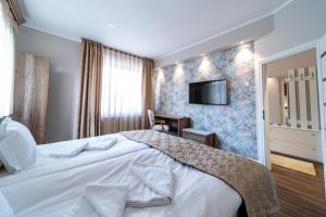 Postel nebo postele na pokoji v ubytování Be my apartman