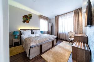 Postel nebo postele na pokoji v ubytování Be my apartman
