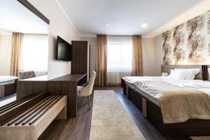 Postel nebo postele na pokoji v ubytování Be my apartman