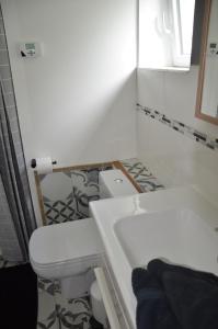 Ванна кімната в Les terrasses de l'artiste
