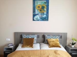 Postel nebo postele na pokoji v ubytování Erdei Szalonka Apartman