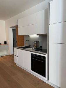 Kuchyňa alebo kuchynka v ubytovaní Appartement Schladming Neu