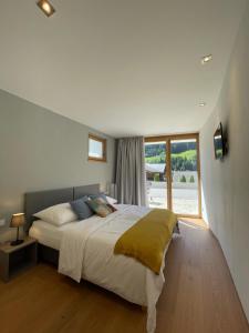 Posteľ alebo postele v izbe v ubytovaní Appartement Schladming Neu