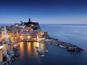 an aerial view of a city with a harbor at night at Annali Casa vacanze - Shabby style nella natura in La Spezia