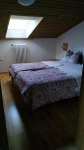 Postel nebo postele na pokoji v ubytování Speckhaus Ferienwohnungen