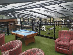 The fitness centre and/or fitness facilities at Posada Rural SPA Granja LA TEJERA de Lozoya