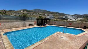 Πισίνα στο ή κοντά στο Apartment Vista del Castillo