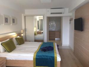a bedroom with a large bed in a room at Side Su Hotel - Adult Only (+16) in Side