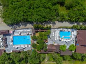 an overhead view of a resort with two pools at ASTORIA in Solotvyno