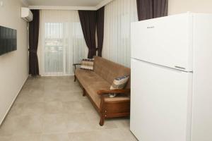 Χώρος καθιστικού στο Lebedos Apart Hotel 1