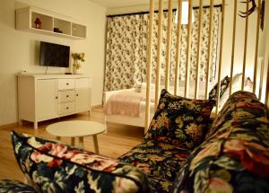 TV a/nebo společenská místnost v ubytování Gosau Apartment 006