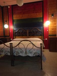 Łóżko lub łóżka w pokoju w obiekcie Osteria dei Tratturi Rooms