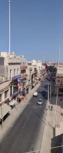 a view of a city street with cars on the road at Central 214 Boutique Hotel in Hamrun