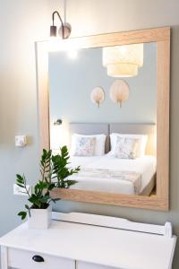 Ein Bett oder Betten in einem Zimmer der Unterkunft Likio Studios