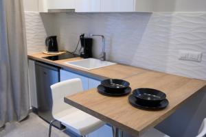Kuchyňa alebo kuchynka v ubytovaní Luxury Suites by Panagiota