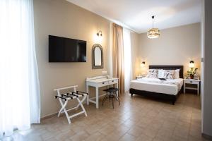 Ein Bett oder Betten in einem Zimmer der Unterkunft Likio Studios
