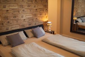 En eller flere senge i et værelse på Ferienwohnung Moselpanorama