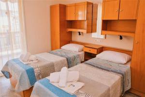 Posteľ alebo postele v izbe v ubytovaní Apartments Tania