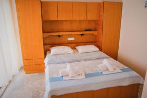 Posteľ alebo postele v izbe v ubytovaní Apartments Tania