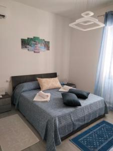 Postel nebo postele na pokoji v ubytování Il Mirto 2.0