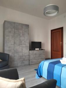 TV a/nebo společenská místnost v ubytování Il Mirto 2.0 + 30 fotografií