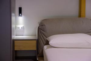 Posteľ alebo postele v izbe v ubytovaní Luxury Suites by Panagiota