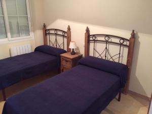 Postel nebo postele na pokoji v ubytování Casa vacacional en Vejer