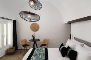 Krevet ili kreveti u jedinici u okviru objekta Allegro Suites Oia