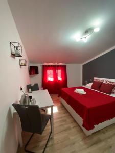 Postel nebo postele na pokoji v ubytování Cadoni Guest House