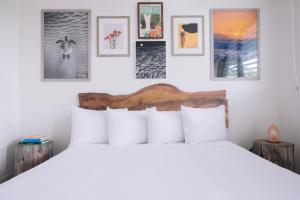 Ένα ή περισσότερα κρεβάτια σε δωμάτιο στο SCP Hilo Hotel
